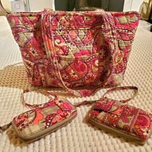 Vera Bradley paisly tote with 2 wristlet wallets.